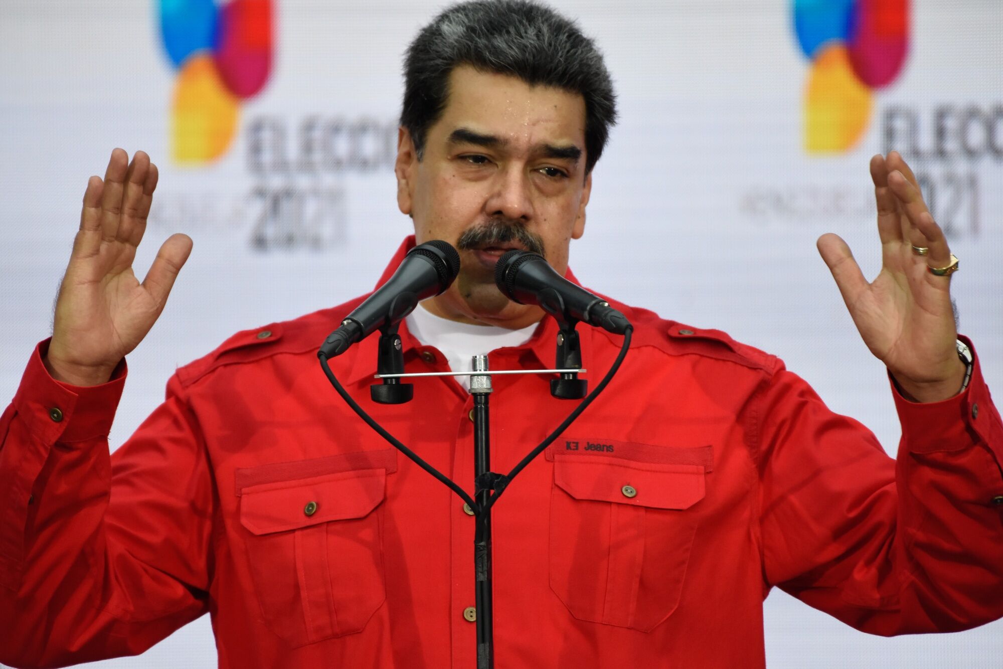 Nicolas Maduro speaks to members of the media after casting a ballot at a polling station during regional elections in Caracas, on Nov. 21.