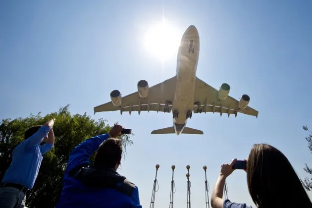 An A380 Airbus airliner lands at the international airport during the XVIII Air and Space Fair in Santiago on March 26, 2014. 