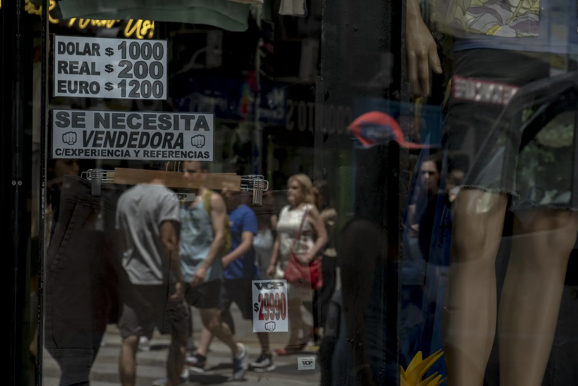 Foreign exchange rates are posted at a store in Buenos Aires last month.&nbsp;