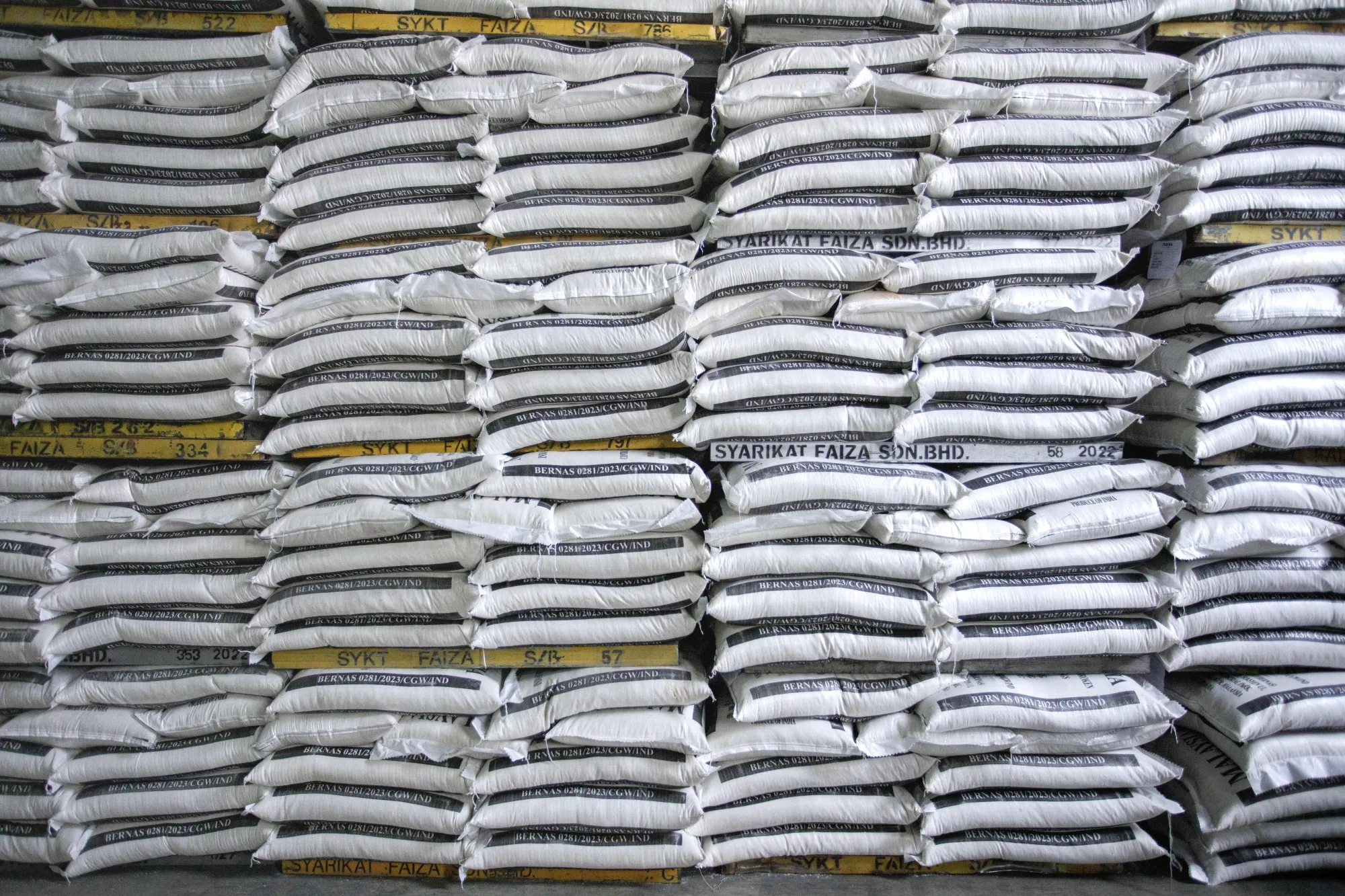Sacks of imported Indian white rice in Subang Jaya, Selangor, Malaysia.