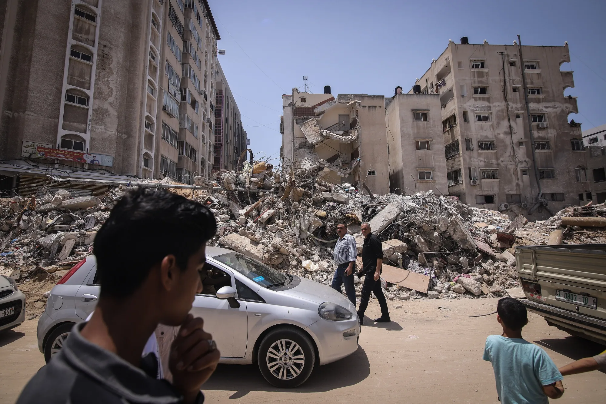 Residential buildings, damaged following Israeli airstrikes, in Gaza City, May 21.&nbsp;