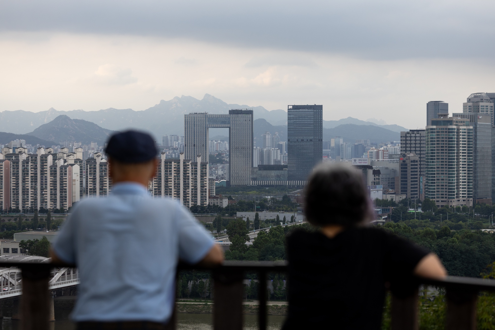 People look out city skyline from the observation deck in Seoul, South Korea, on Sunday, July 21, 2024. South Korea is scheduled to release its second-quarter gross domestic product (GDP) figures on July 25. Bloomberg