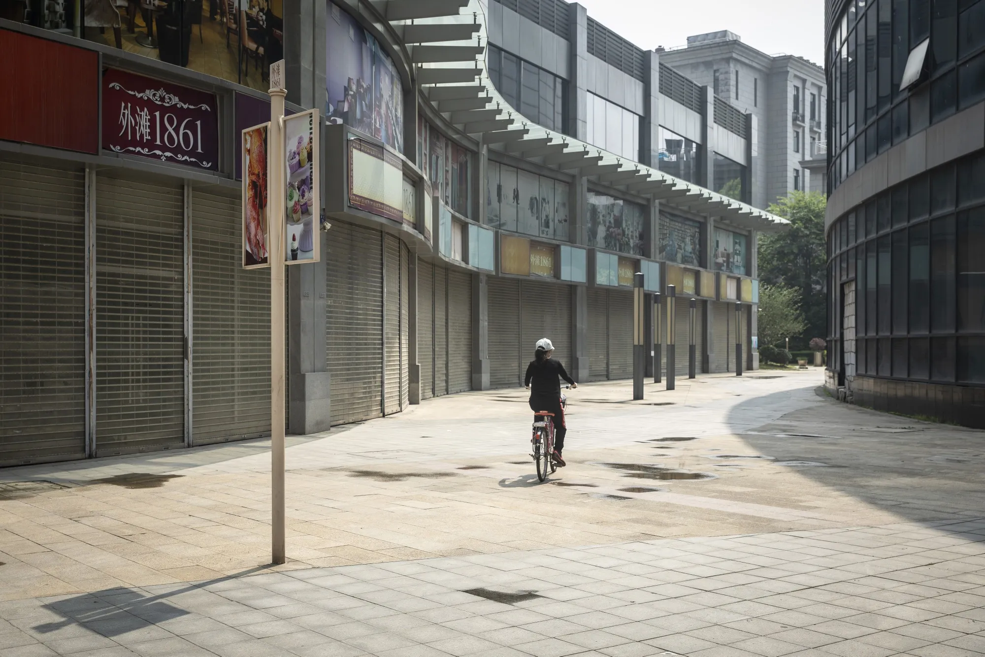 Life In Wuhan As Road From Lockdown to Liberty Paved With Economic Trade-Offs