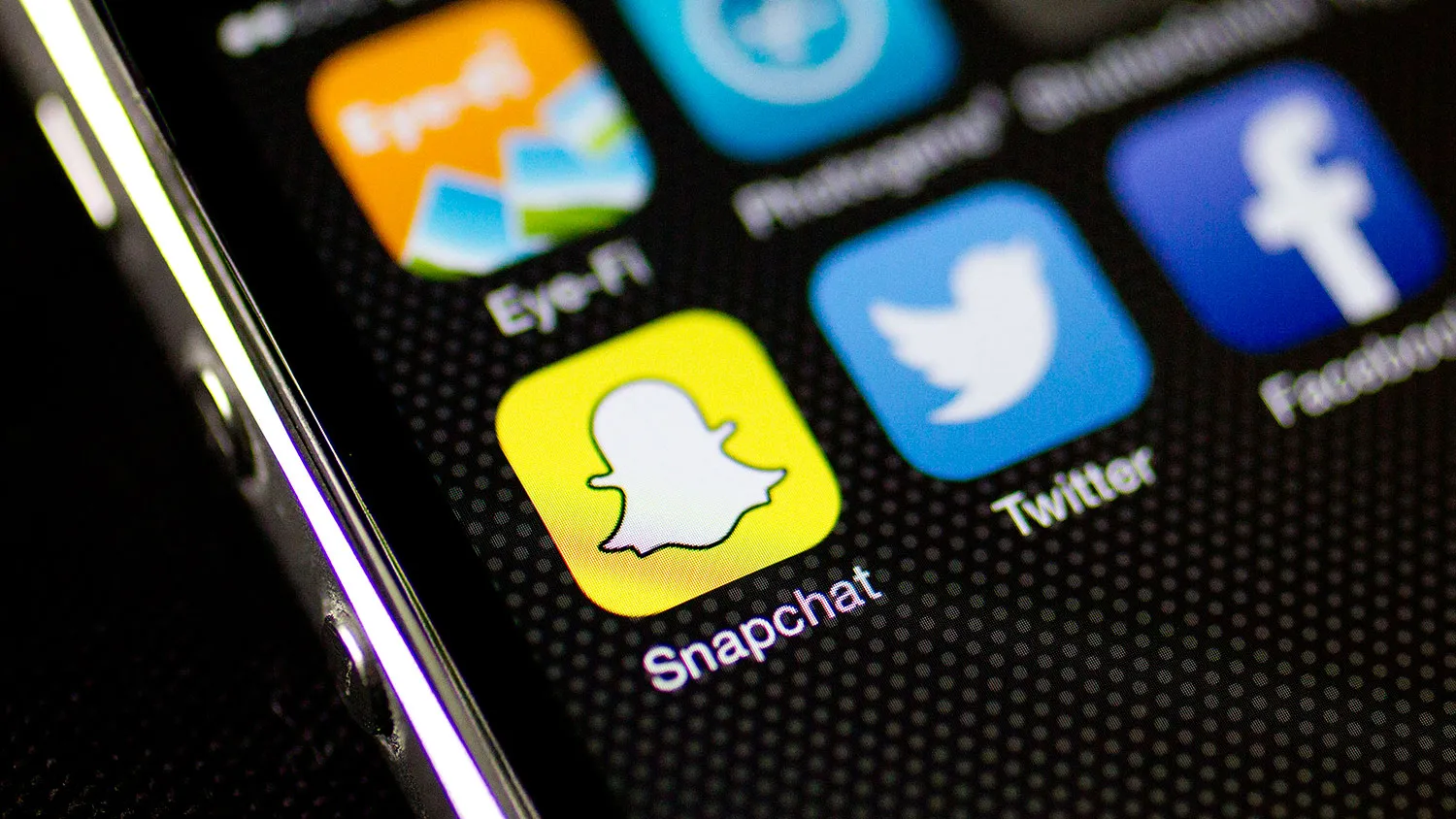 The Snapchat Inc. application (app) is seen on an on an Apple Inc. iPhone 5s displayed for a photograph in Washington, D.C., U.S., on Wednesday, Feb. 18, 2015.
