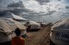 A Venezuelan child flies a kite at the United Nations High Commission for Refugees (UNHCR) camp in Maicao, Colombia.