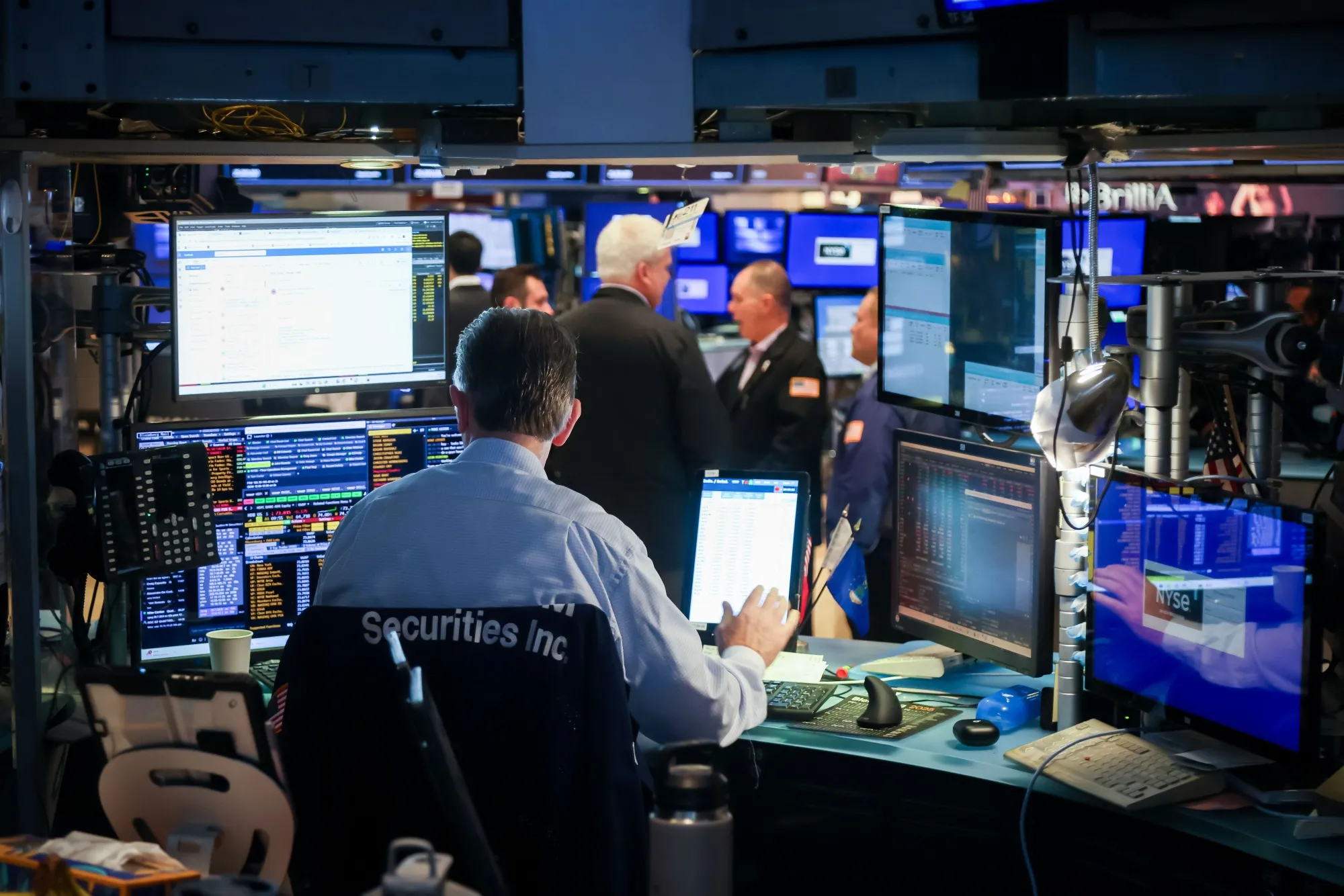 Traders work on the floor at the New York Stock Exchange&nbsp;