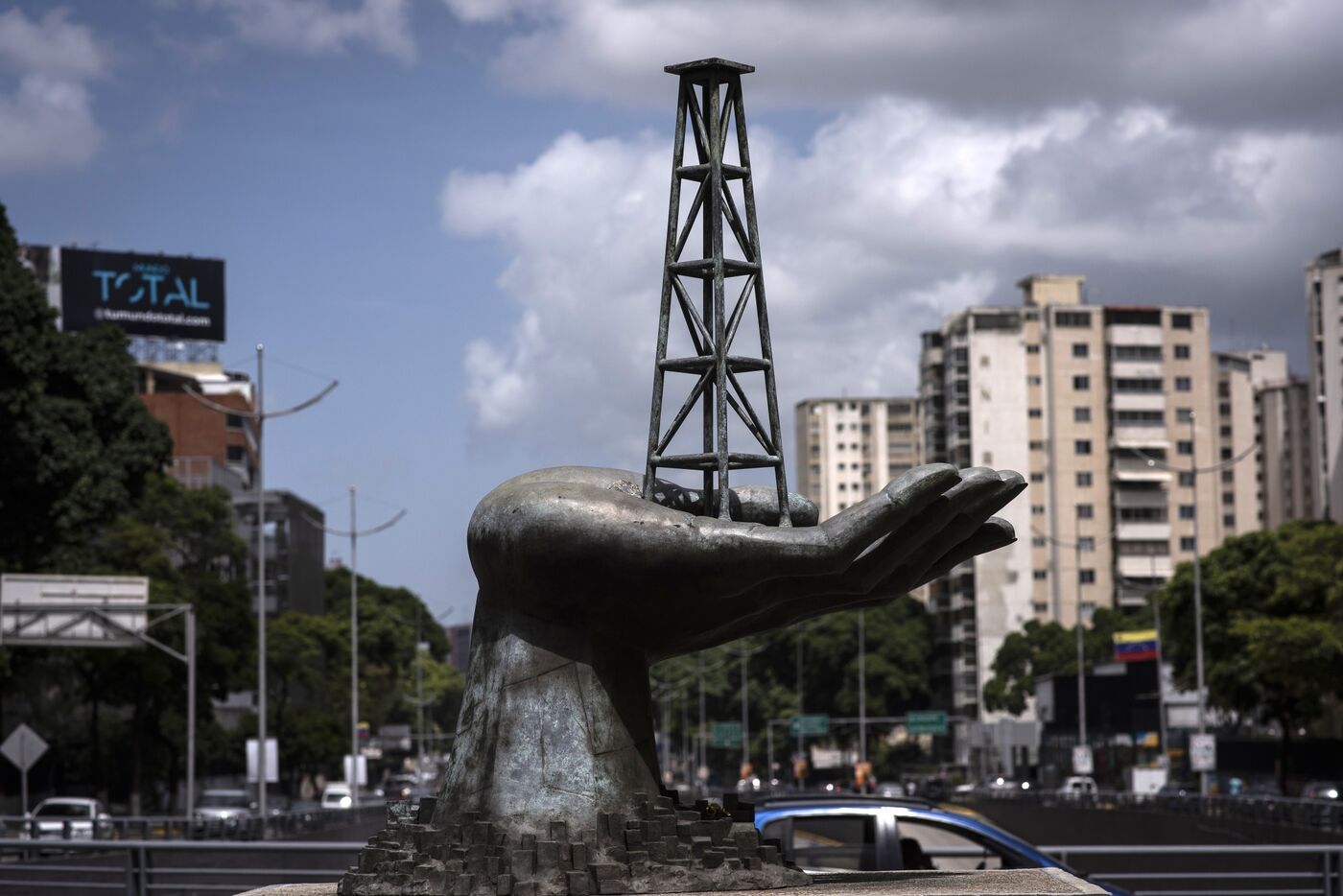 A sculpture, depicting an oil derrick in a hand, outside the Petroleos de Venezuela SA (PDVSA) headquarters in Caracas, Venezuela.