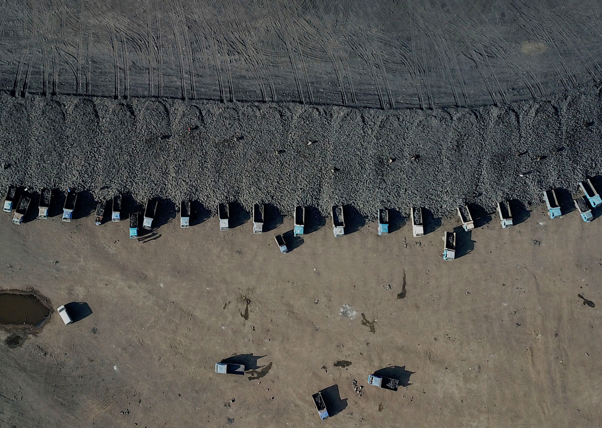 Coal is driven from a mine in Datong, China.