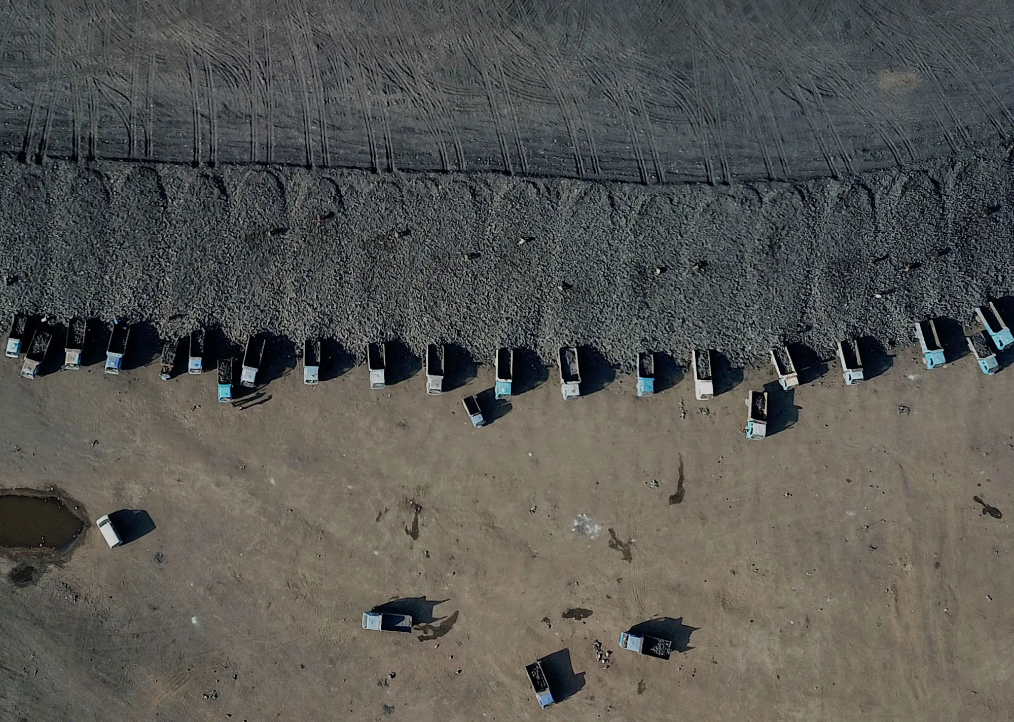 Coal is driven from a mine in Datong, China.