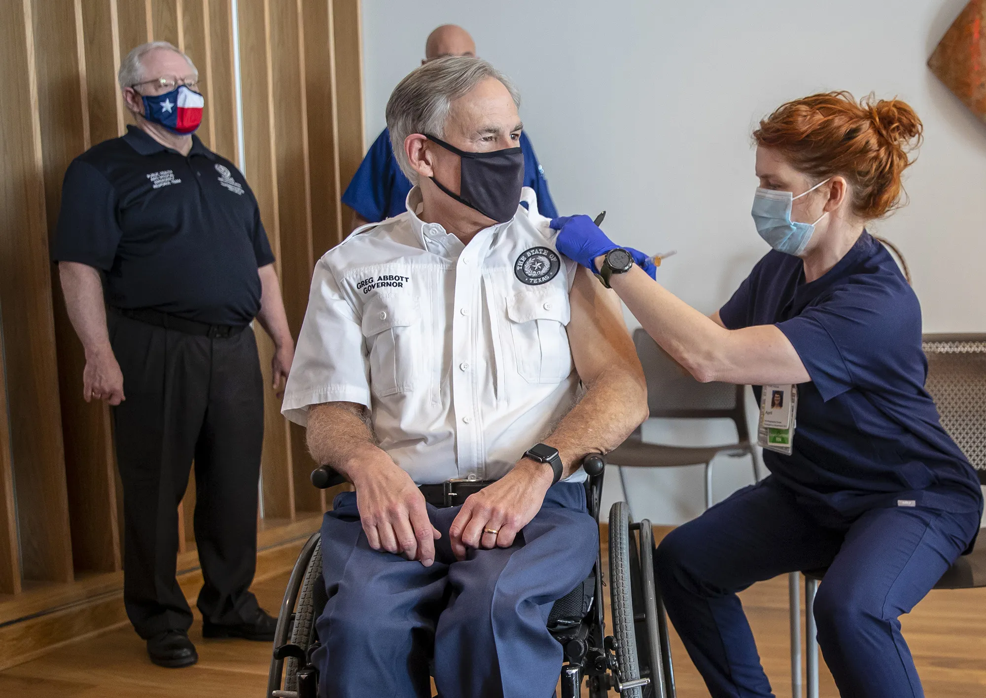 Greg Abbott receives a vaccine dose in Austin, Texas on Dec. 22, 2020.