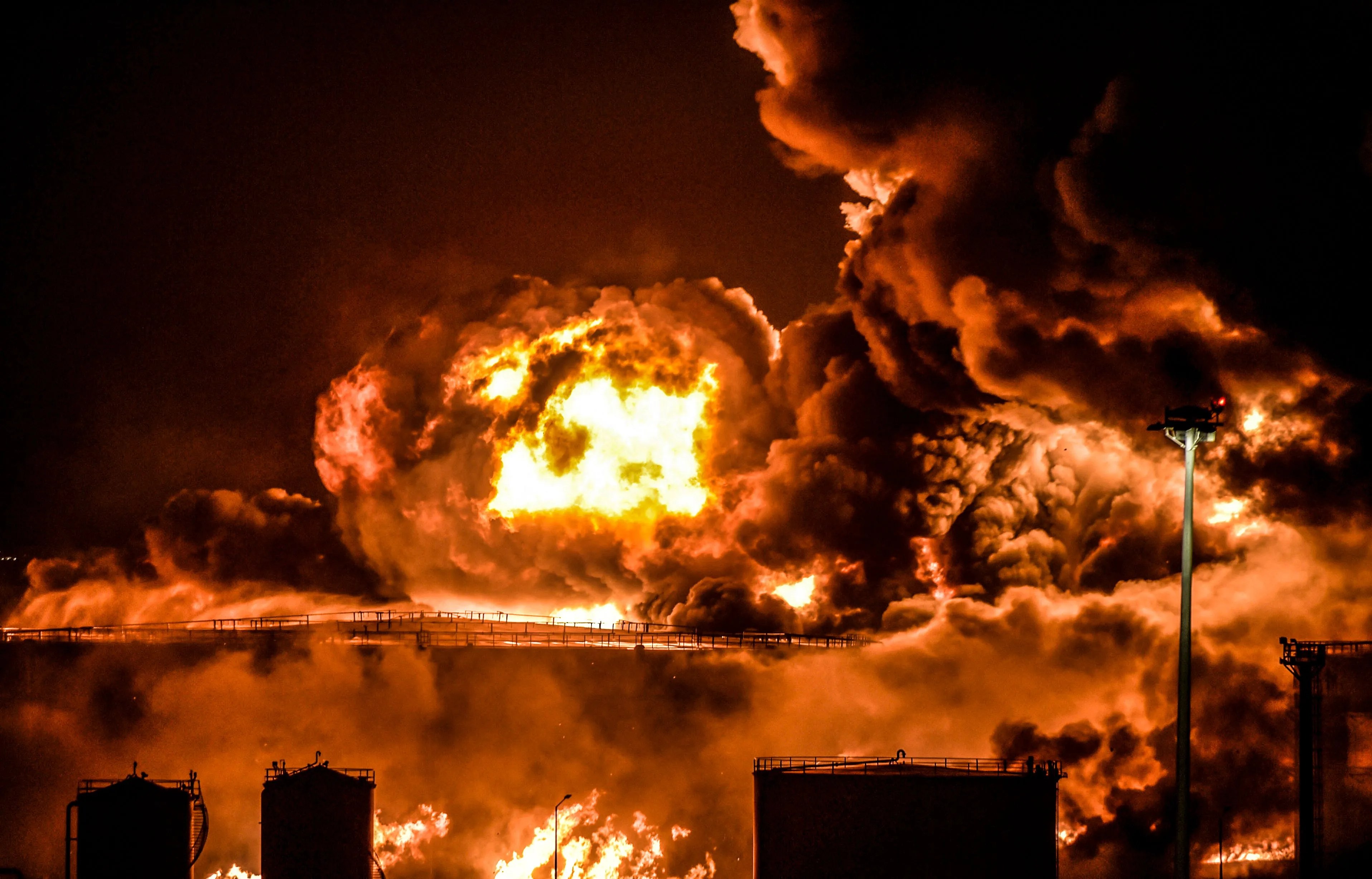 Smoke and flames rise from a Saudi Aramco oil facility in Saudi Arabia's Red Sea coastal city of Jeddah, on March 25.