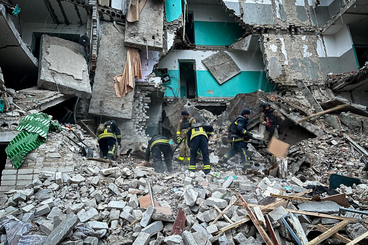 Emergency services at the site of a Russian attack in Sumy region, Ukraine, in a photo released on Nov. 19.