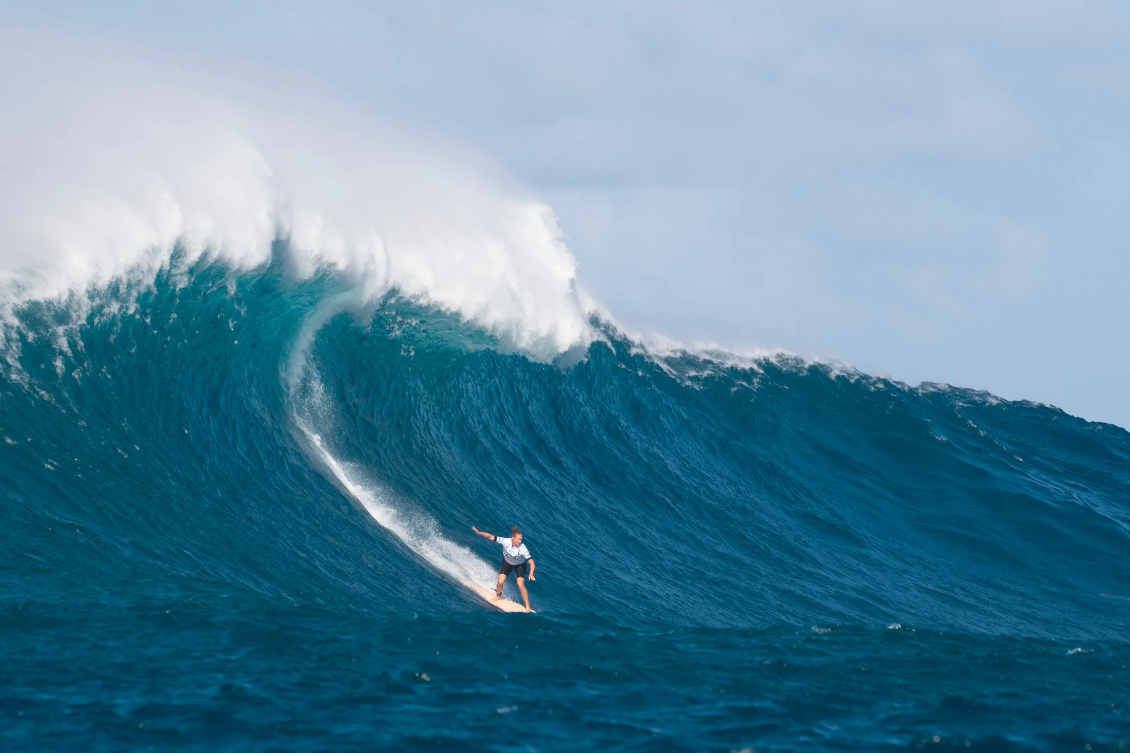 Hawaiis Paige Alms performs during the big wave riding competition at Jaws off Maui Island of Hawaii on December 12, 2019.