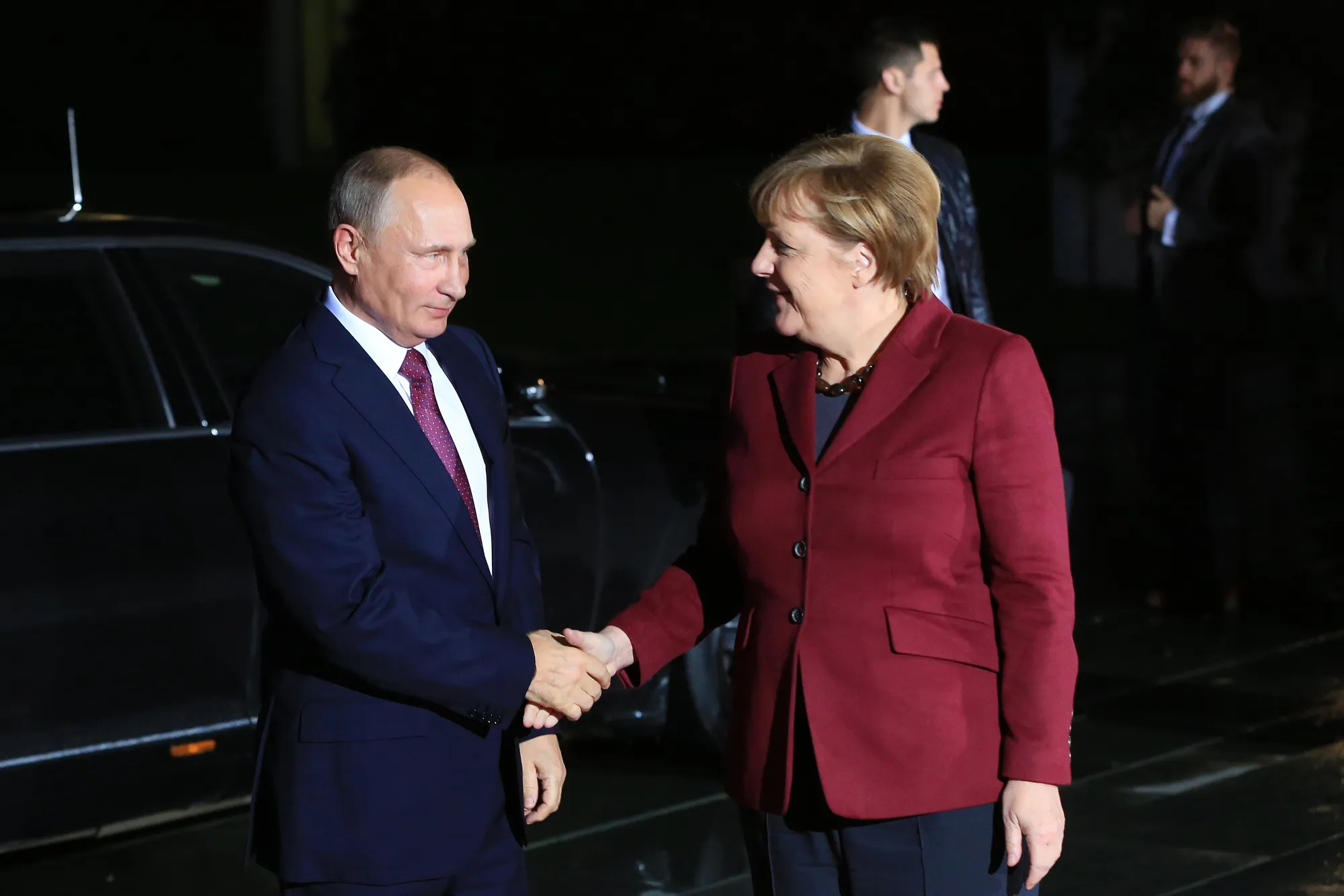 Angela Merkel shakes hands with Vladimir Putin ahead of a four-way leaders' summit at the Chancellery in Berlin, Germany, on&nbsp;Oct. 19, 2016.&nbsp;