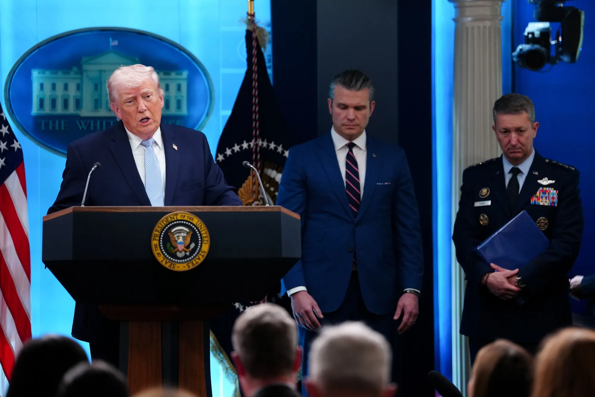 President Donald Trump with Defense Secretary Pete Hegseth and Joint Chiefs of Staff Chair John D. Caine.