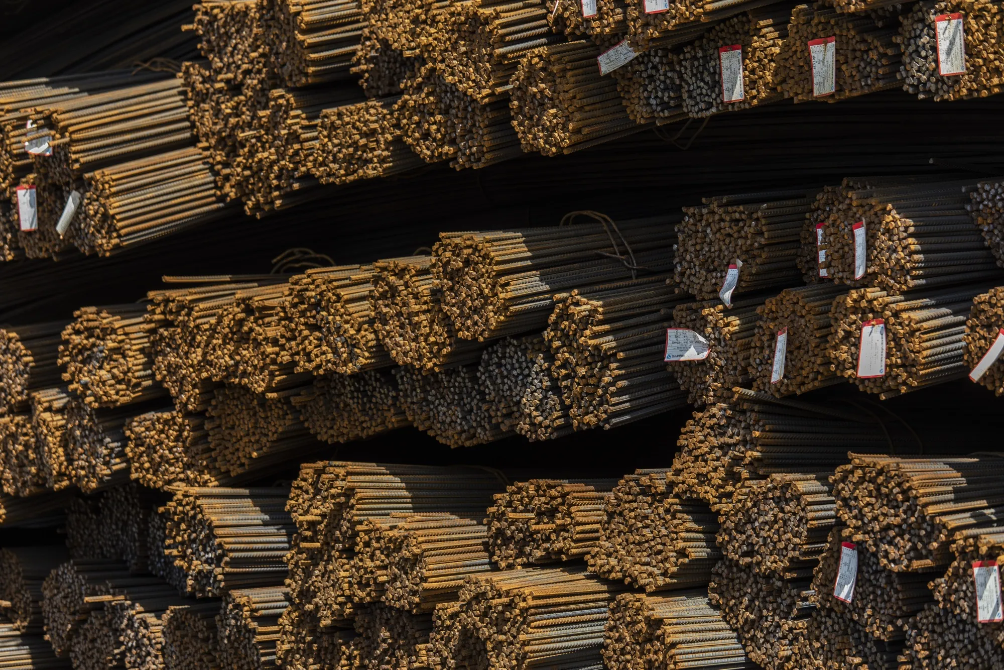 Bundles of steel reinforcing bar at a metal stock yard in Shanghai, China, on Monday, June 7, 2021.&nbsp;