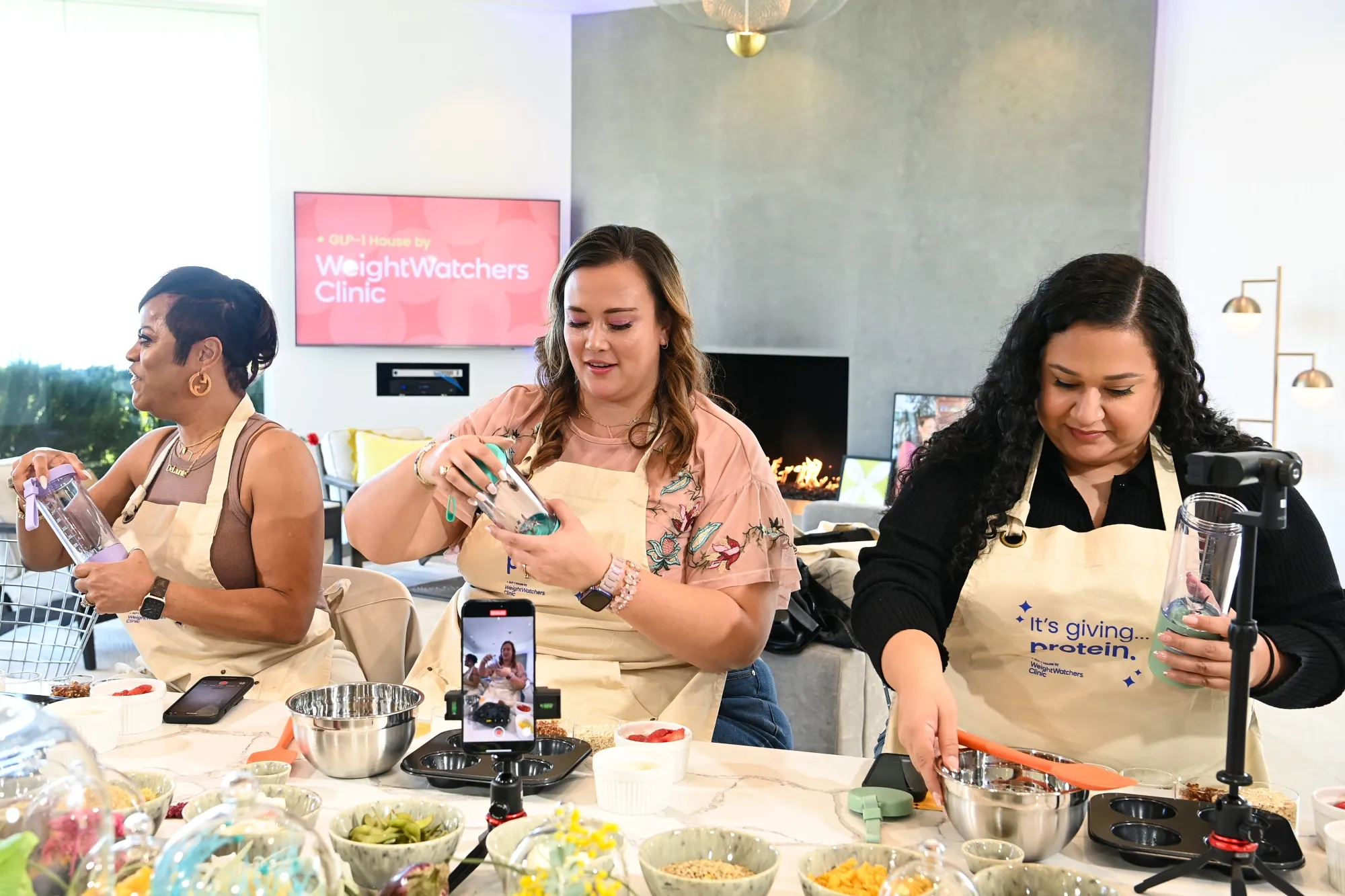 DeLaunte Crawford, Mackenzie Fisher and Brenda Ortiz attend the WeightWatchers GLP-1 House in Los Angeles, California.