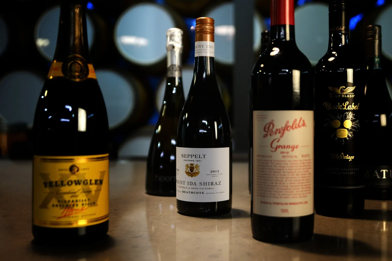 Bottles of Yellowglen XV Piccadilly 2004 vintage,&nbsp;Seppelt Mount Ida Shiraz 2012 vintage, Penfolds Grange 2009 vintage, and Wolf Blass Black Label, produced by Treasury Wine Estates.