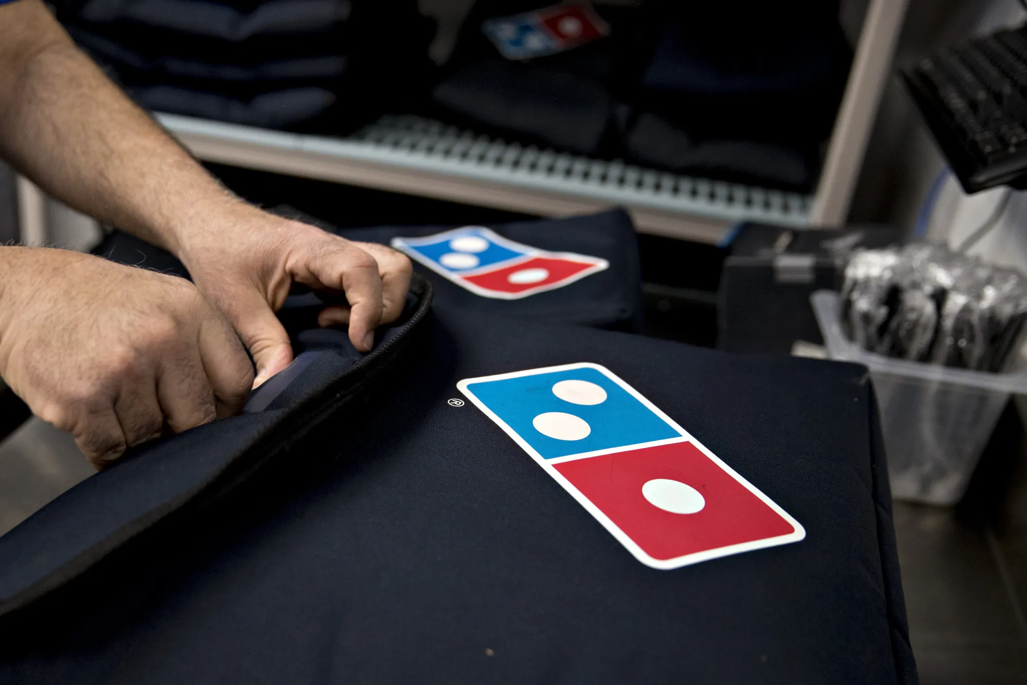 An employee prepares a delivery at a Domino's Pizza&nbsp;restaurant in Chantilly, Virginia.