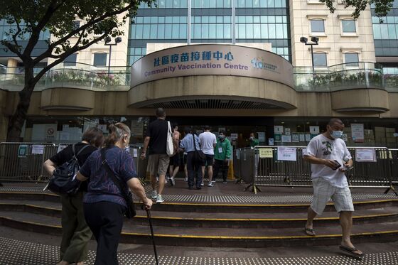 Hong Kong Won’t Open Up Before Vaccination Hits at Least 80%
