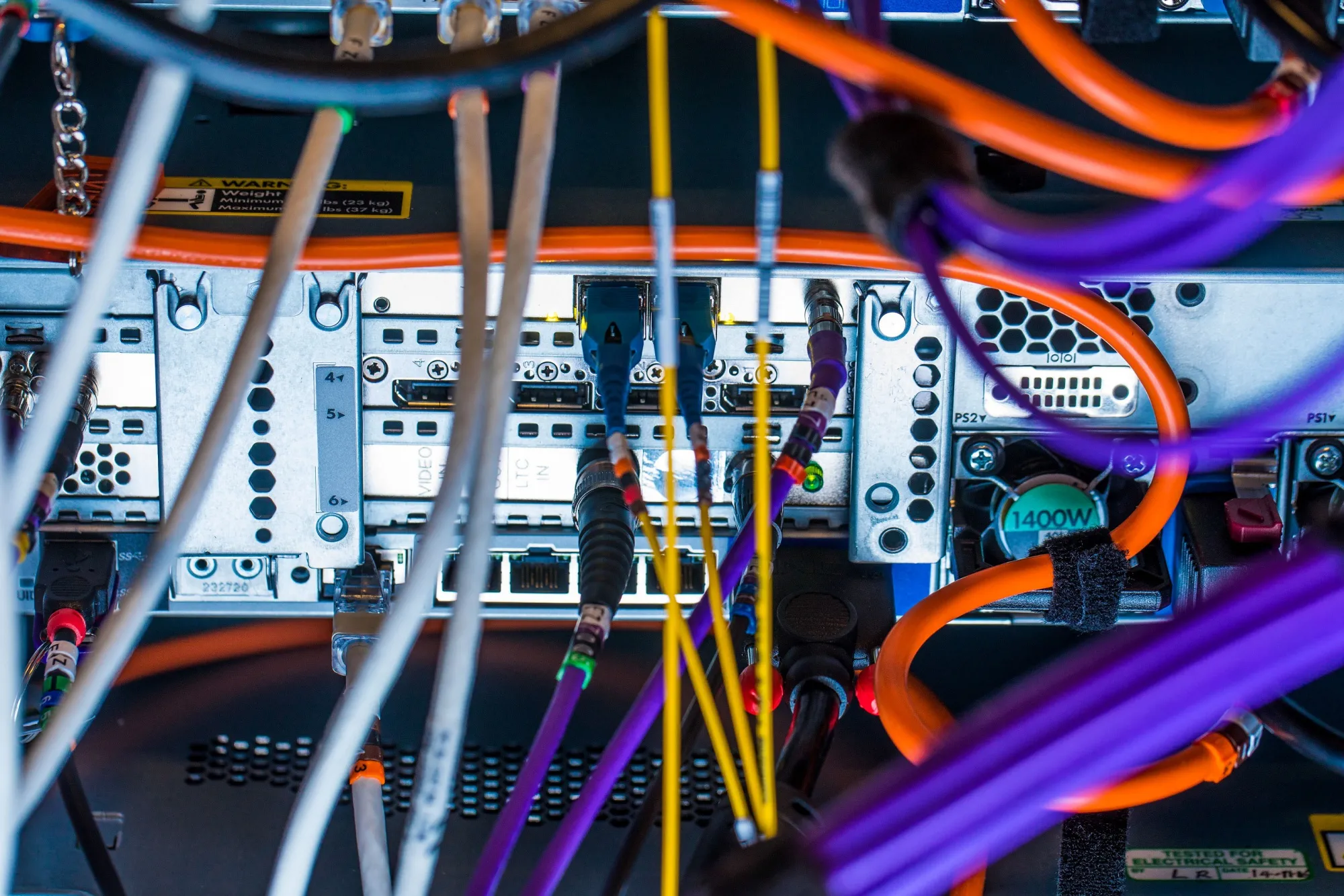 Cables feed into a communications room at an office in London.