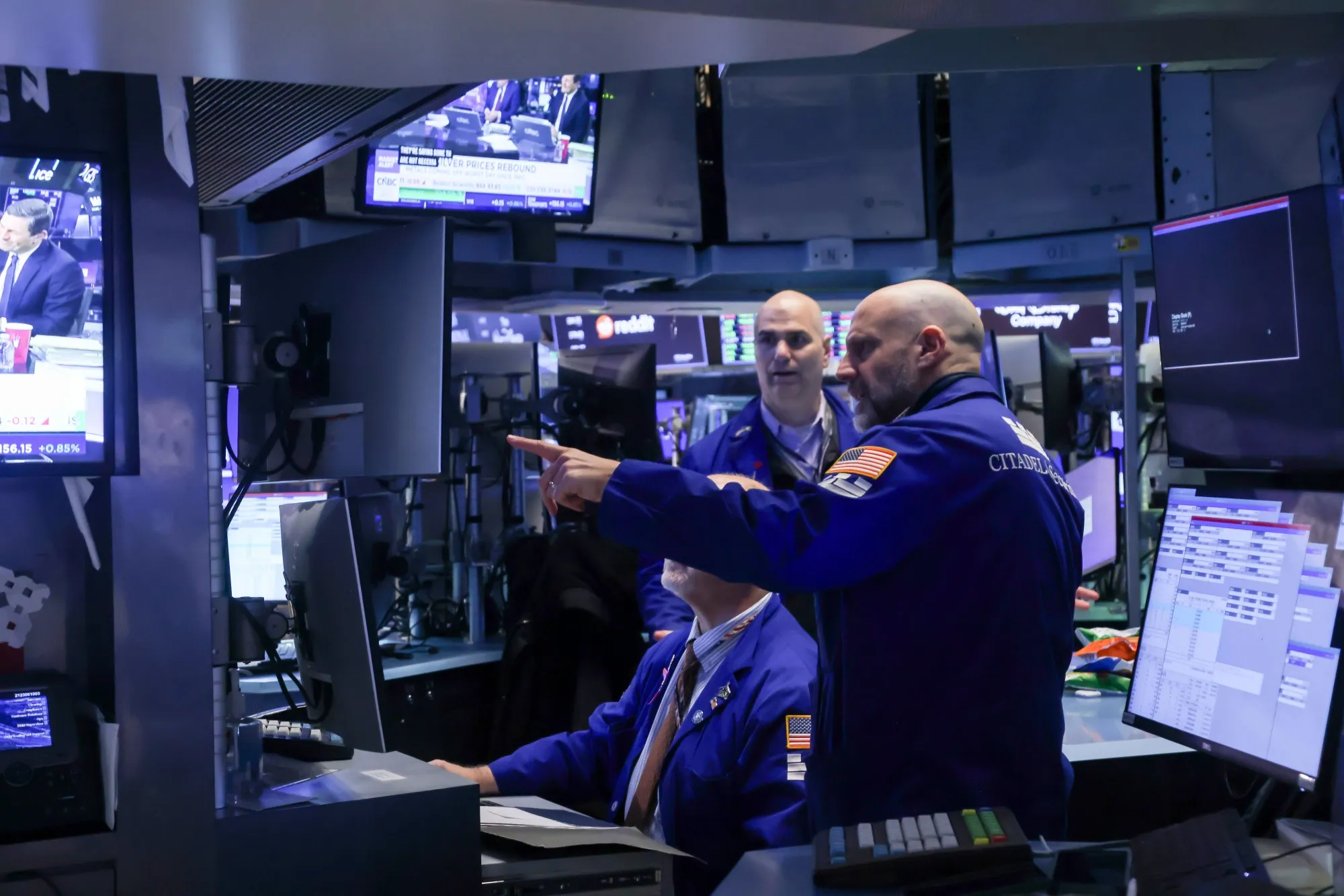 Traders work on the floor the New York Stock Exchange.