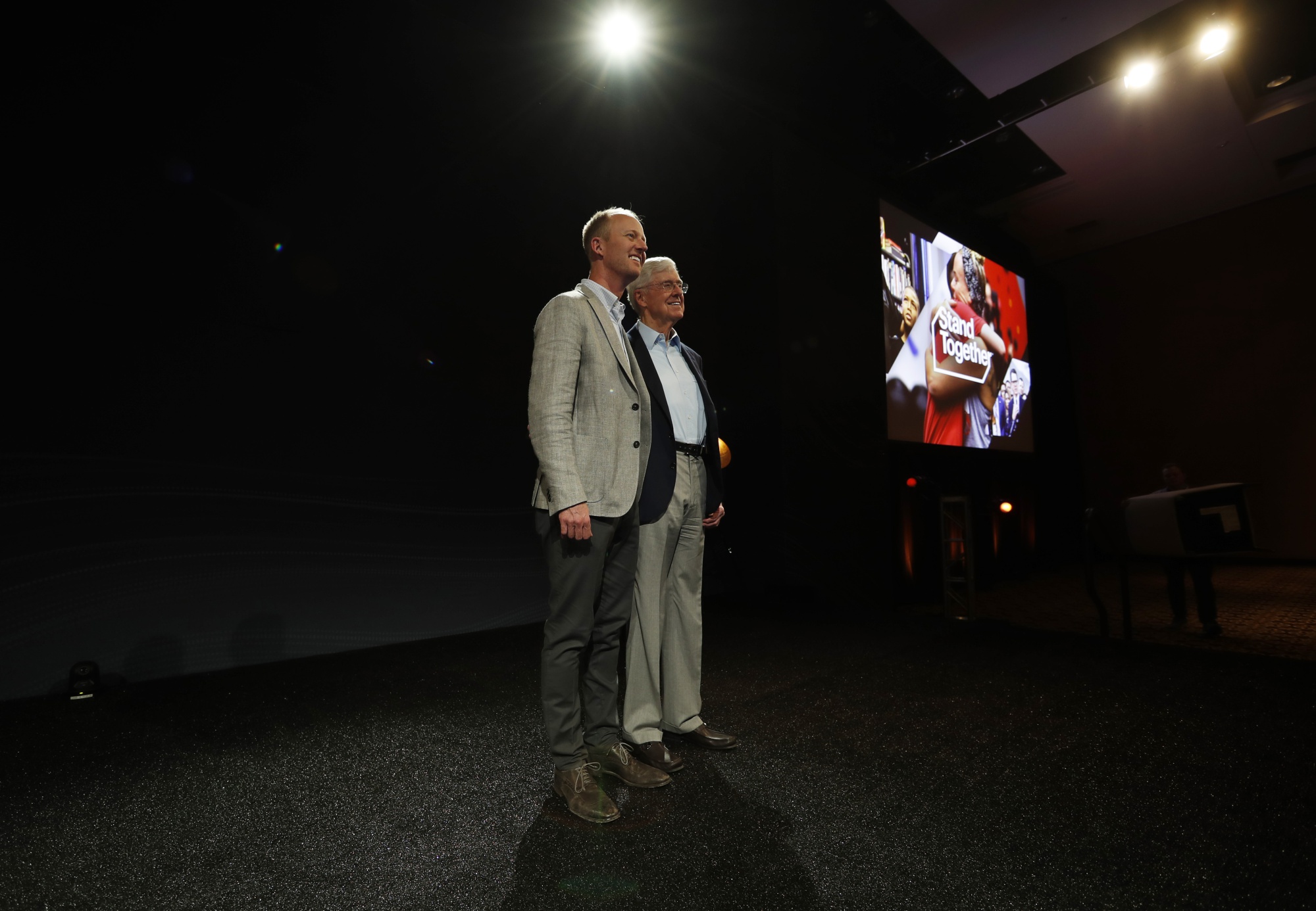 Chase Koch, front, and his father, Charles Koch, chief executive officer of Koch Industries, on June 29, 2019.