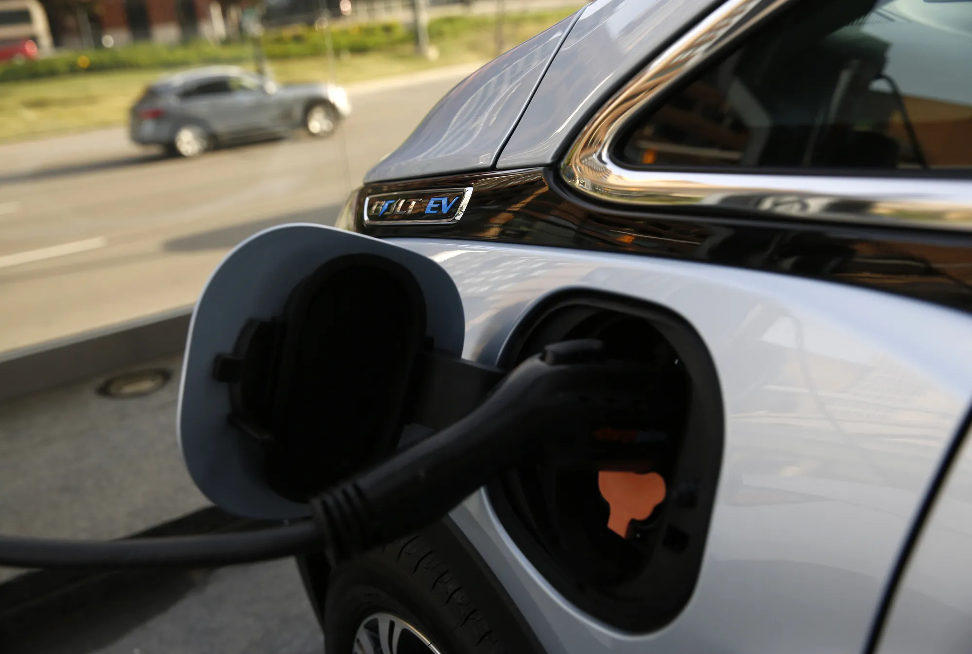 A Chevrolet Bolt electric vehicle charging&nbsp;outside the company's headquarters in June 2018.