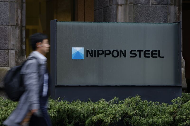 Signage for Nippon Steel Corp. outside the Marunouchi Park Building, which houses the company's headquarters, in Tokyo, Japan