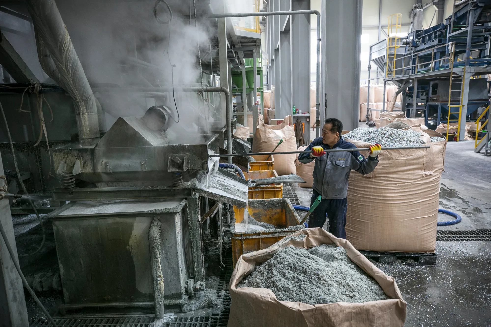 Operations At Recycling Facilities As China's Ban On Waste Products Causes Trash Pile-ups