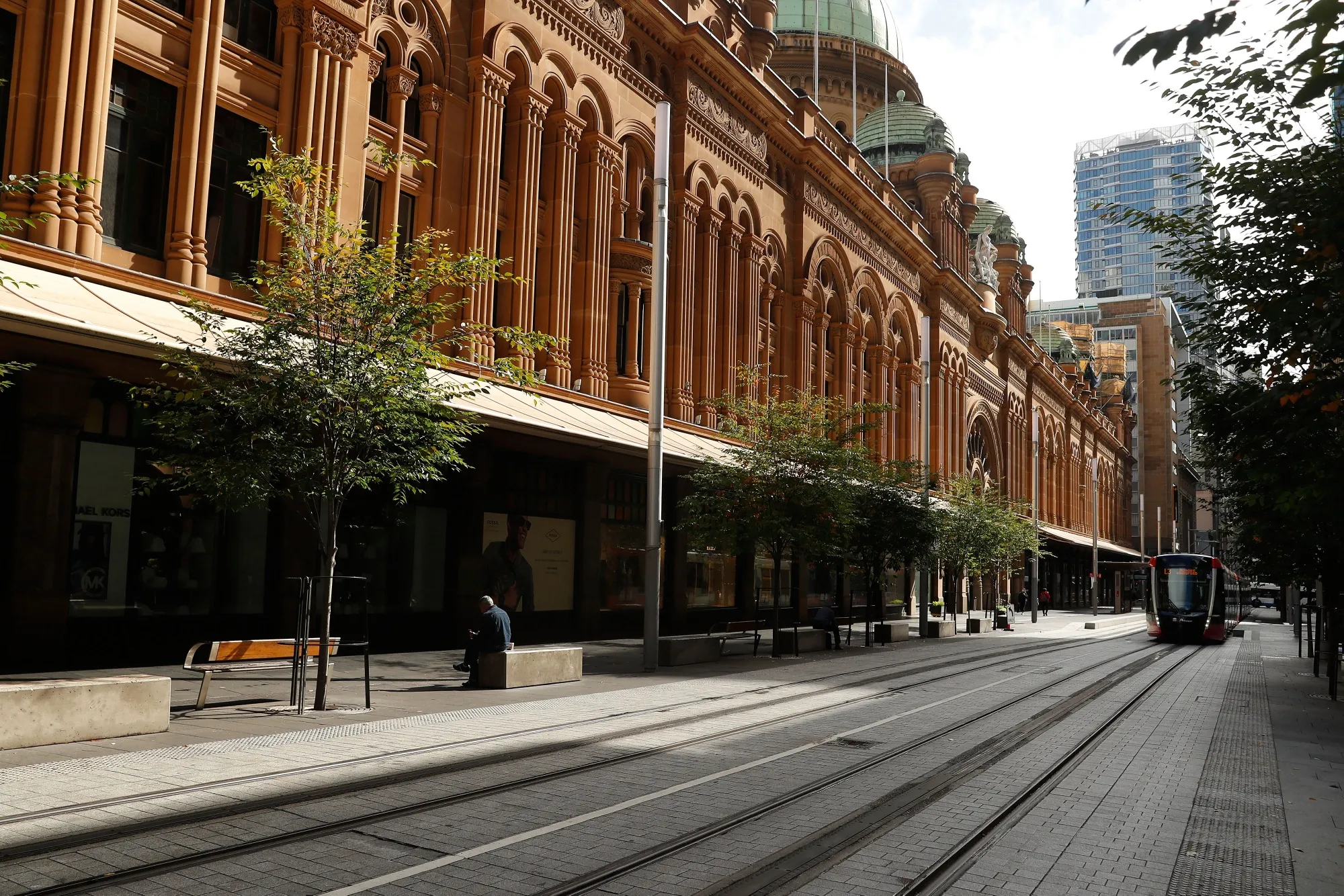The Queen Victoria Building on a near-empty street during a partial lockdown in Sydney.
