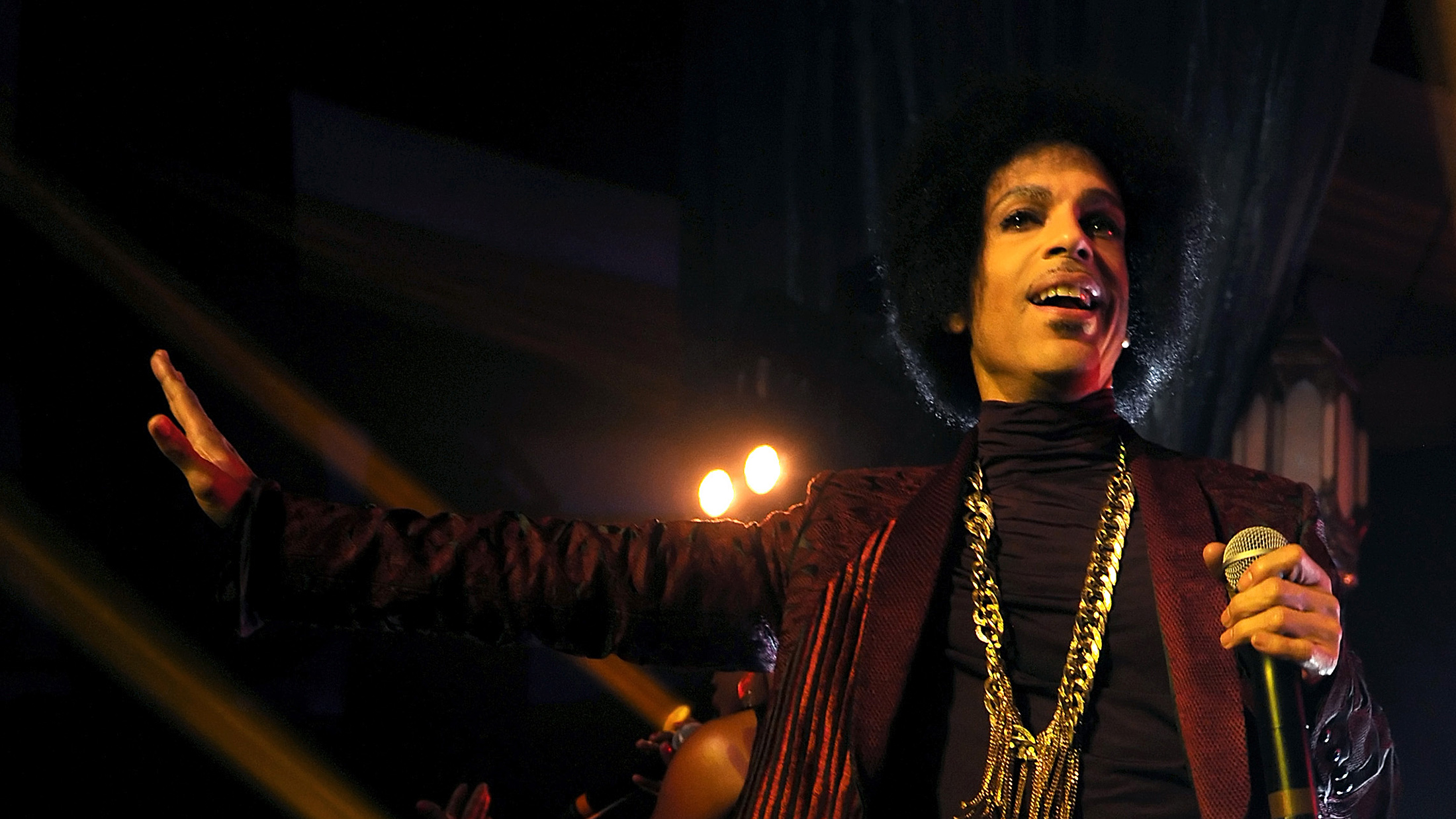Prince performs onstage at The Hollywood Palladium on March 8, 2014 in Los Angeles, California.
