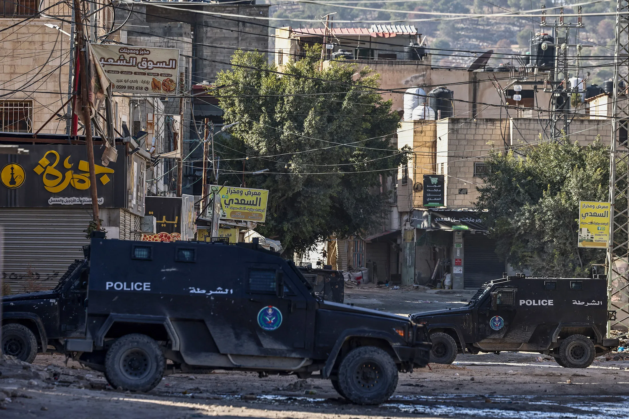 Palestinian Authority security forces vehicles block a road amid clashes with militants in the Jenin camp in the Israel-occupied West Bank on Dec. 15.