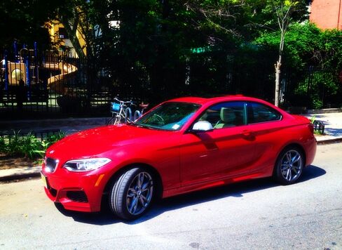 The M235i includes xenon headlights, hands-free Bluetooth and USB, and dynamic brake and stability control, all as standard features.