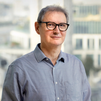 Stylized headshot in Bloomberg office of Matthew Brooker