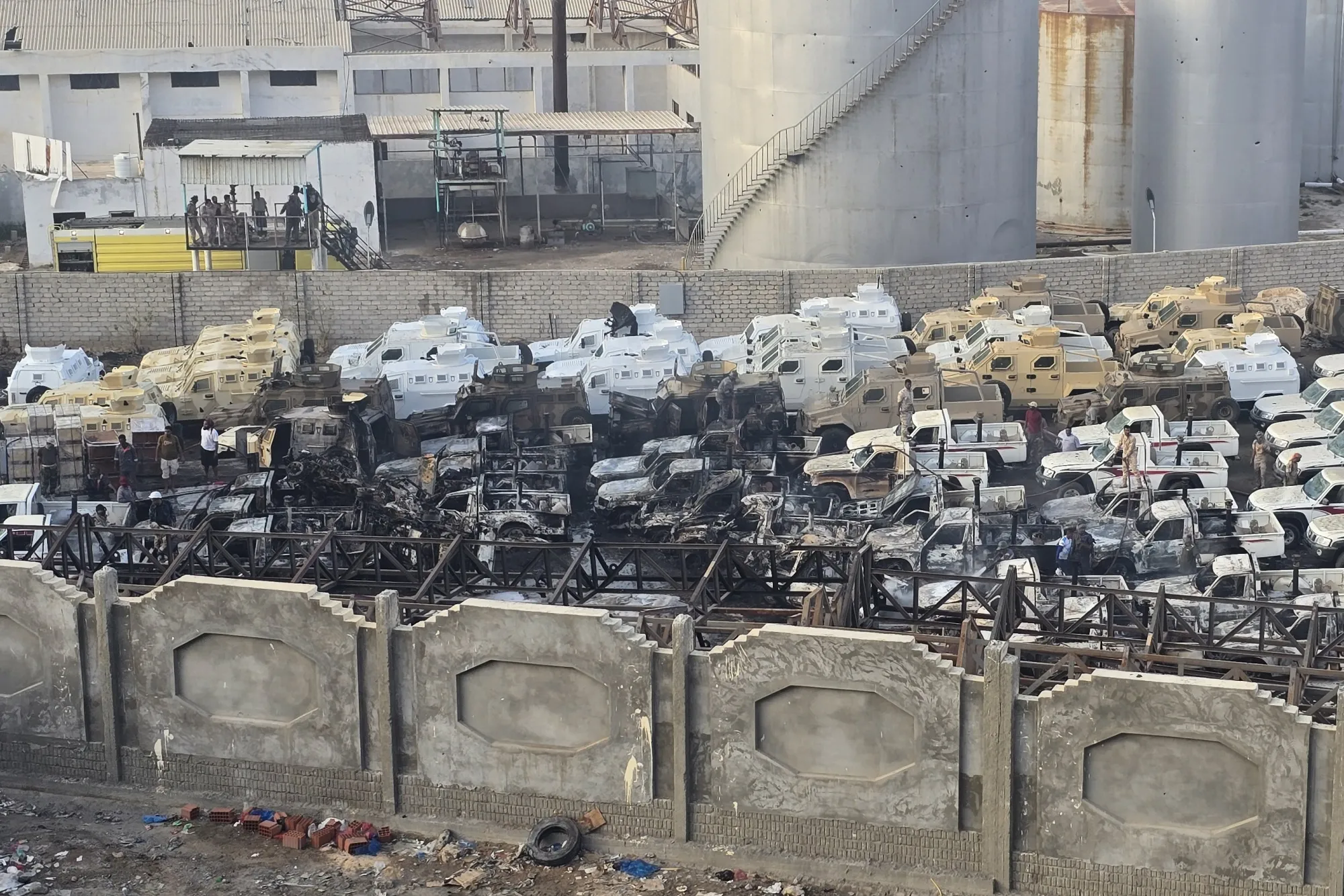 Damaged military vehicles following a Saudi-led coalition air strike in Mukalla, Yemen, in December.