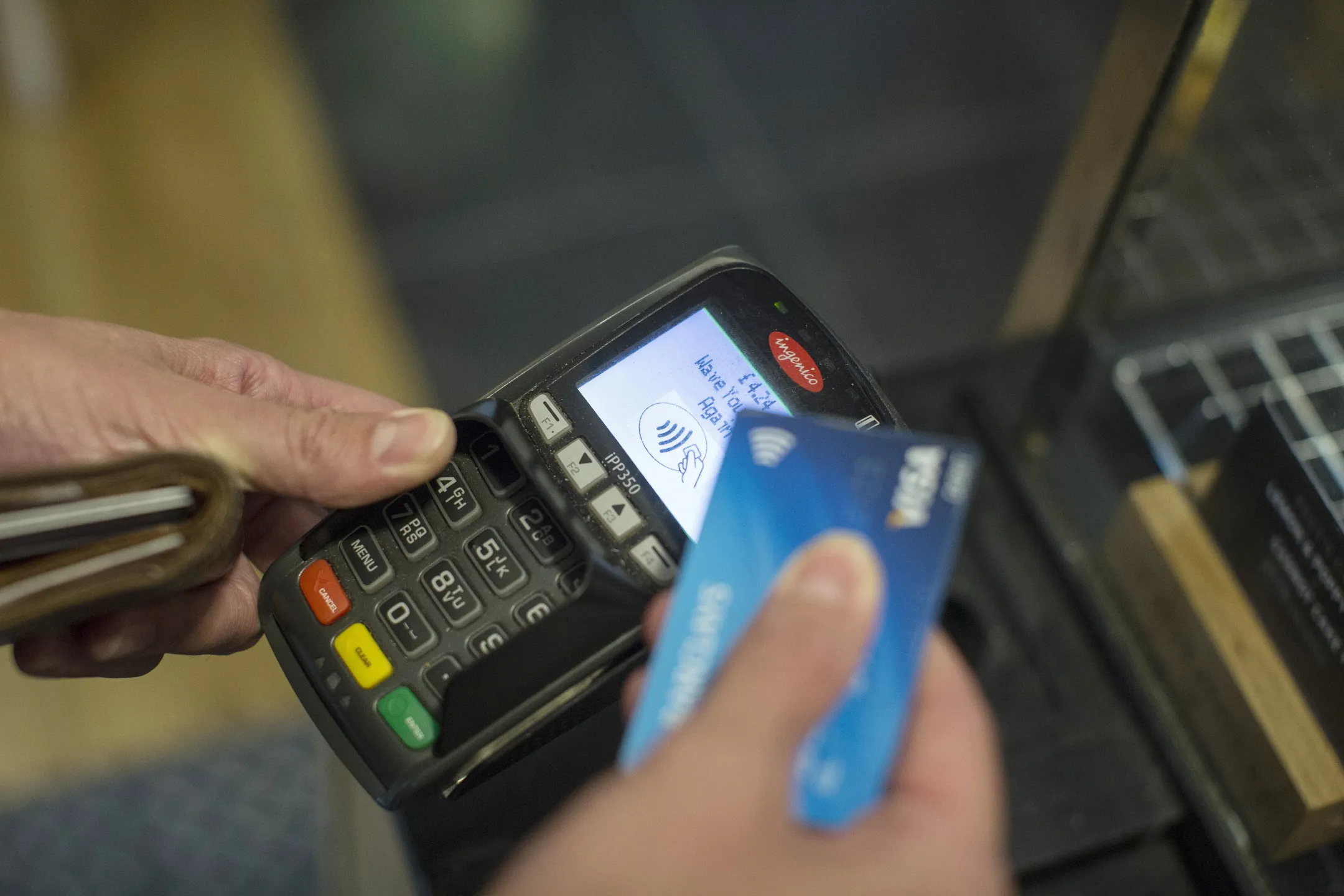 Customers Pay With Contactless Cards