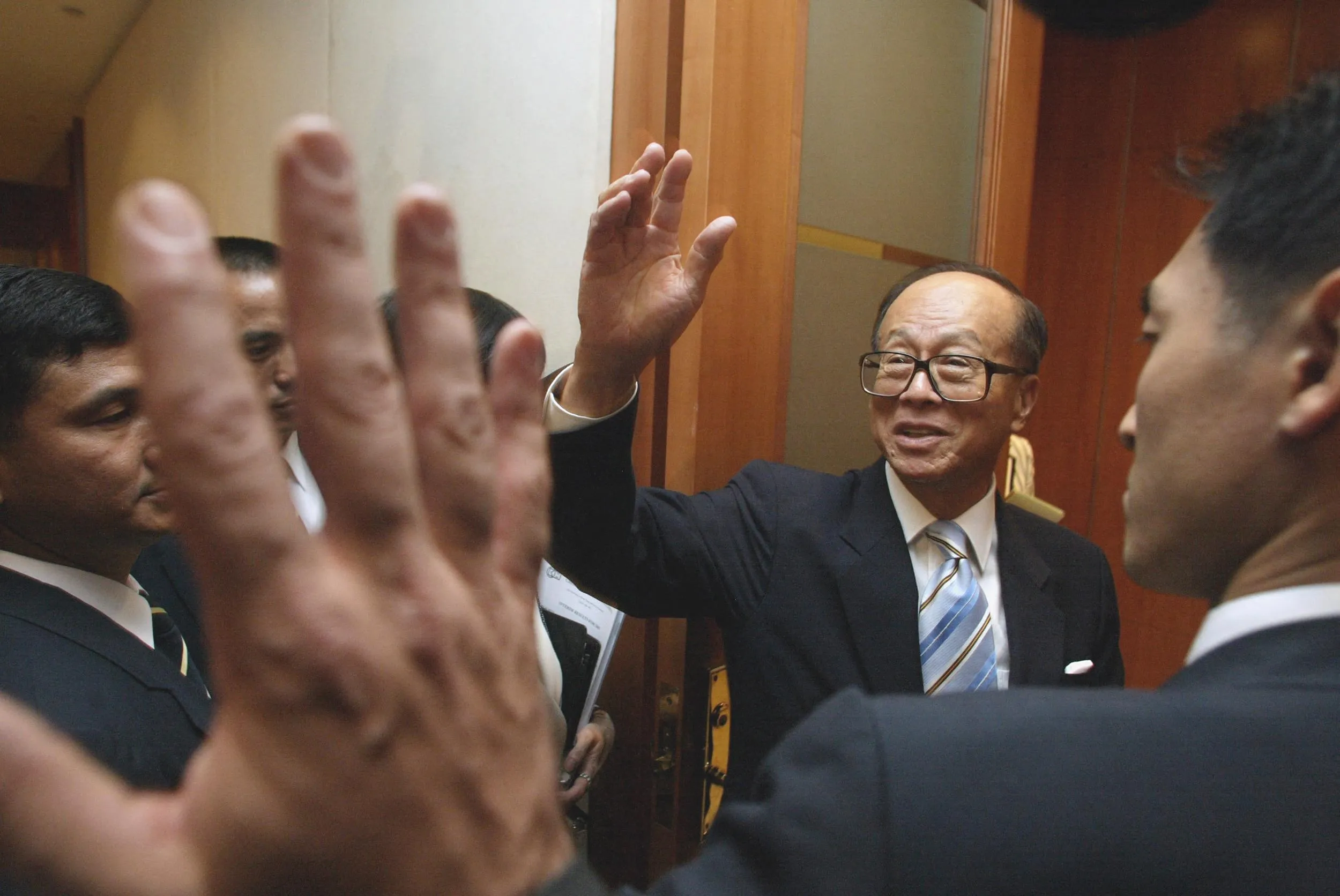 Li Ka-shing, seen here in his younger days, just cut one of his boldest deals.