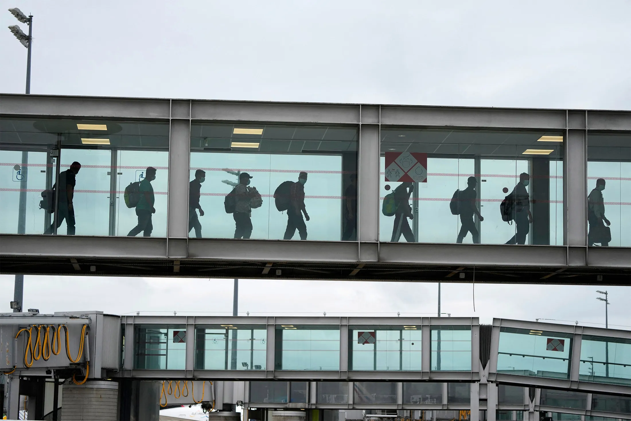 French nationals who fled Afghanistan&nbsp;arrive after landing at Roissy Charles-de-Gaulle, in France, on Aug. 17.