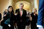 Senator Joe Manchin, a Democrat from West Virginia, speaks to members of the media while walking to a bipartisan meeting on infrastructure at the U.S. Capitol in Washington, D.C.,&nbsp;June 23.&nbsp;