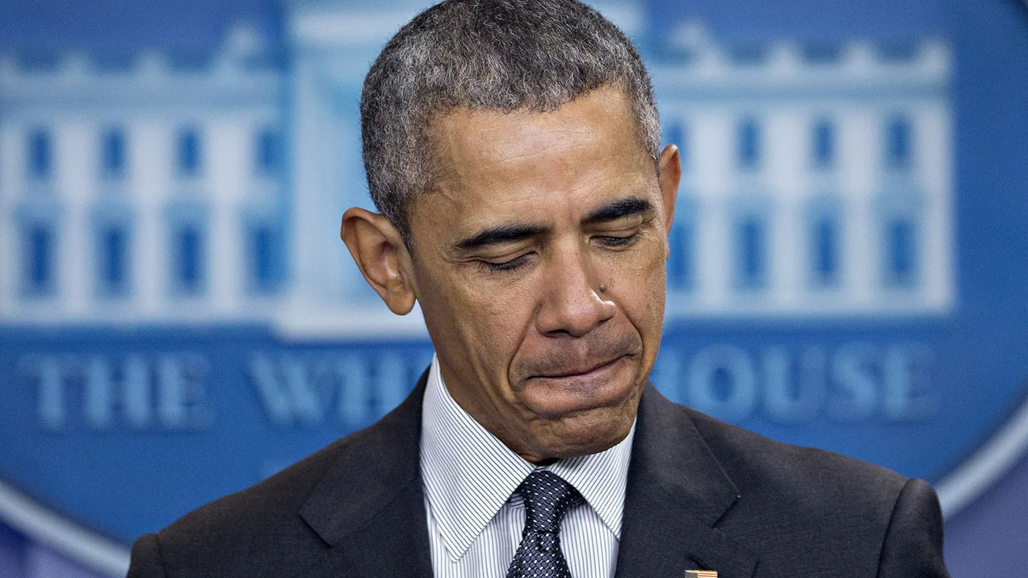 President Barack Obama pauses while speaking during a news conference at the White House on April 5, 2016.
