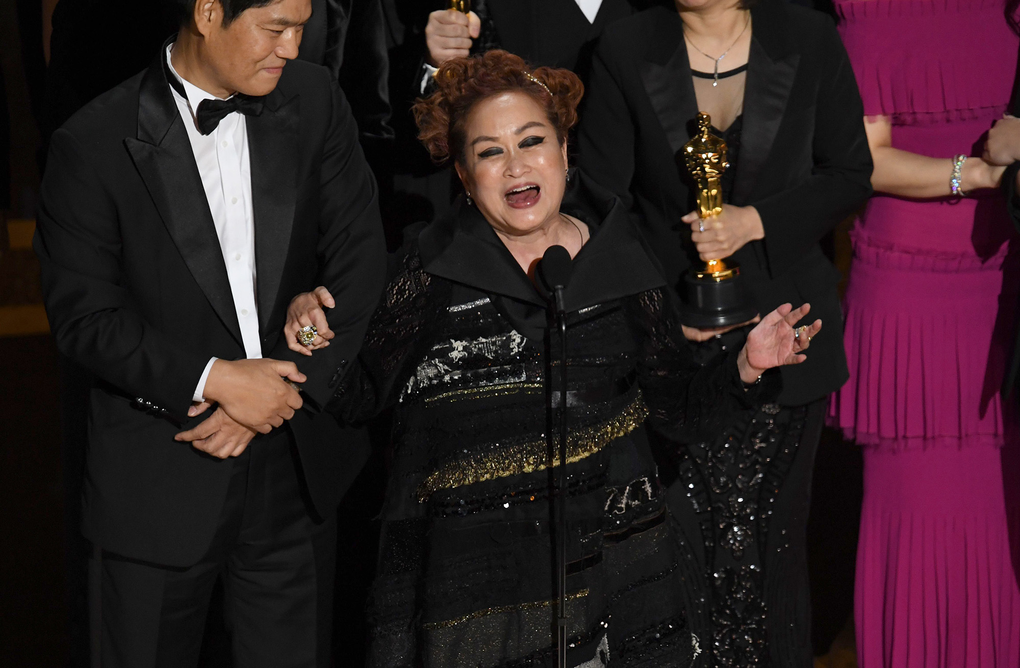 Miky Lee accepts the Best Picture award for ‘Parasite’ during the Academy Awards in Hollywood on Feb. 9.