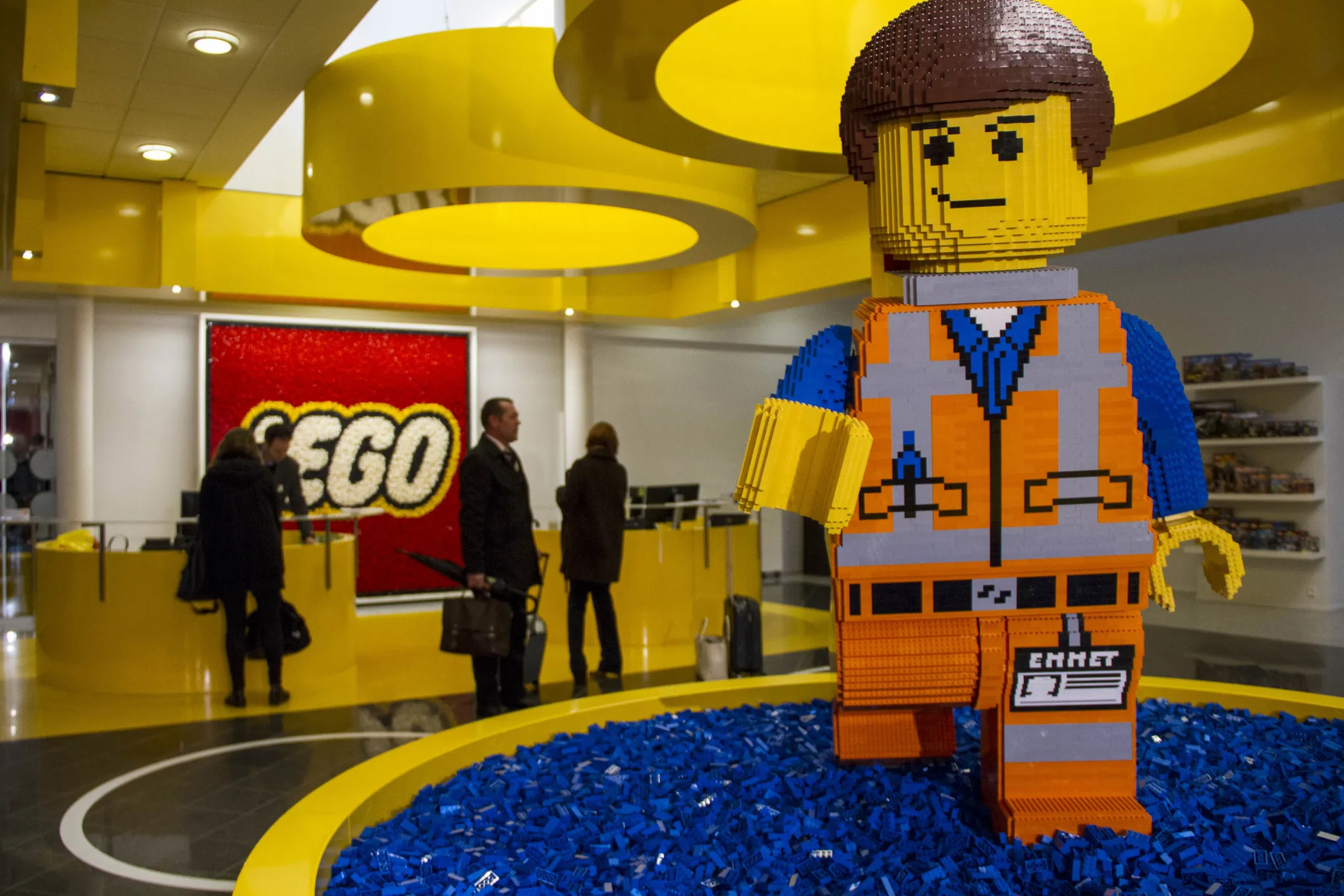 A Lego brick figurine of Emmet Brickowoski, a character from "The Lego Movie", stands in the reception area at the headquarters of Lego A/S in Billund, Denmark, on Wednesday, Feb. 25, 2015.
