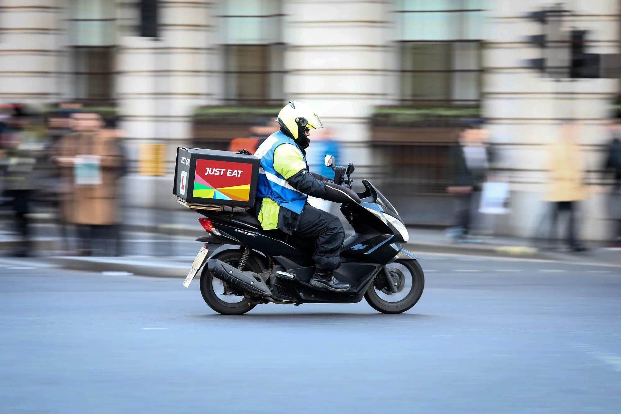 A food delivery courier, working for Just Eat Plc, travels in London.