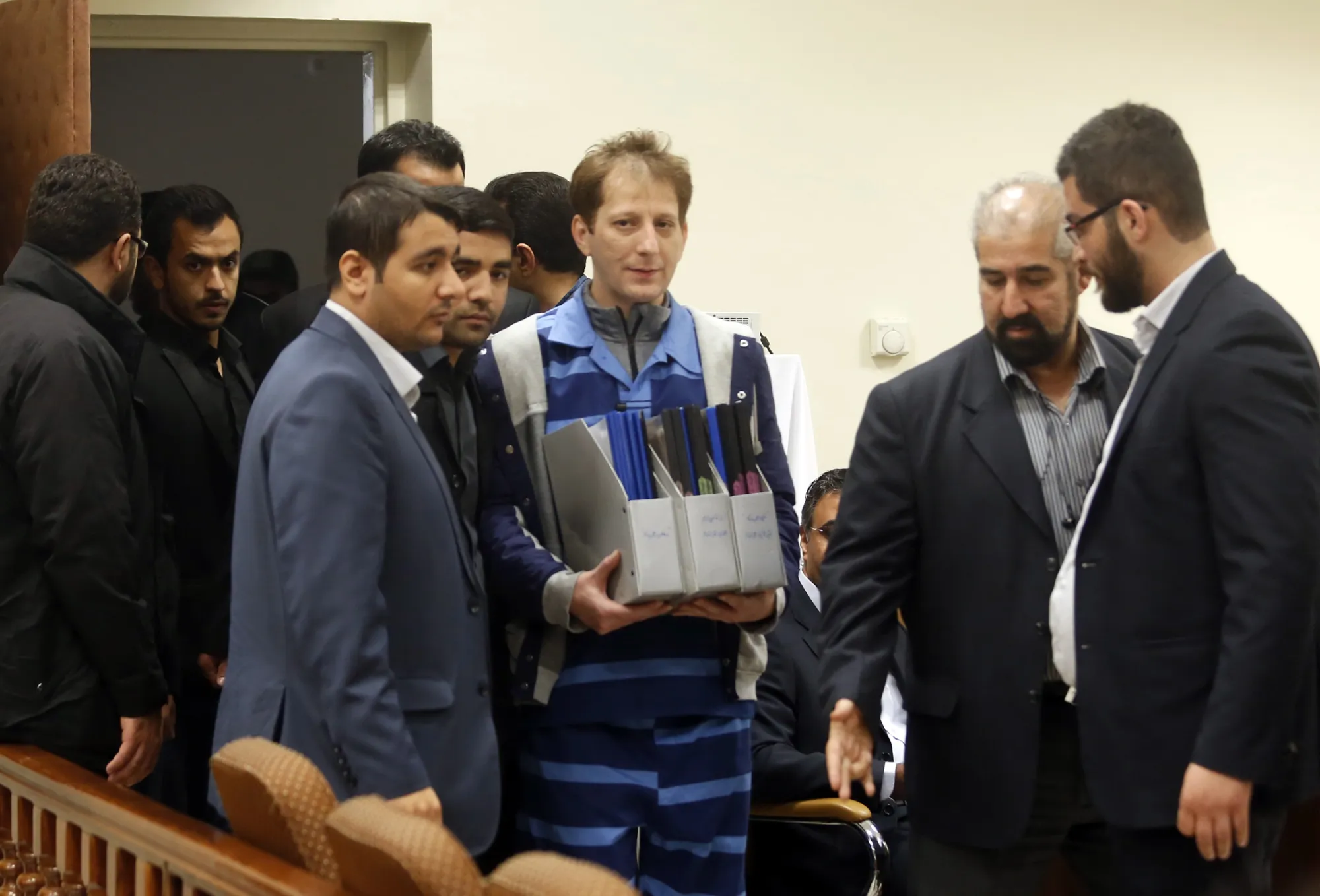 Babak Zanjani, in blue, in a Tehran court in November 2015.
