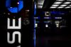JPMorgan Chase & Co. signage is illuminated at night at a bank branch in Chicago, Illinois, U.S., on Tuesday, July 10, 2017. JPMorgan Chase & Co. is scheduled to release earnings figures on July 13.