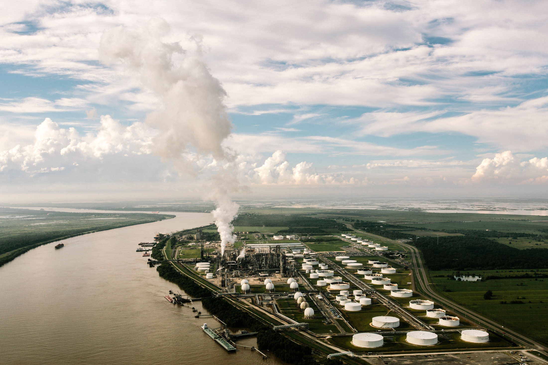 The Phillips 66 oil refinery on the bank of the Mississippi River in Plaquemines Parish, near the Louisiana Coastal Protection and Restoration Authority’s Bayou Dupont Marsh and Ridge Creation.
