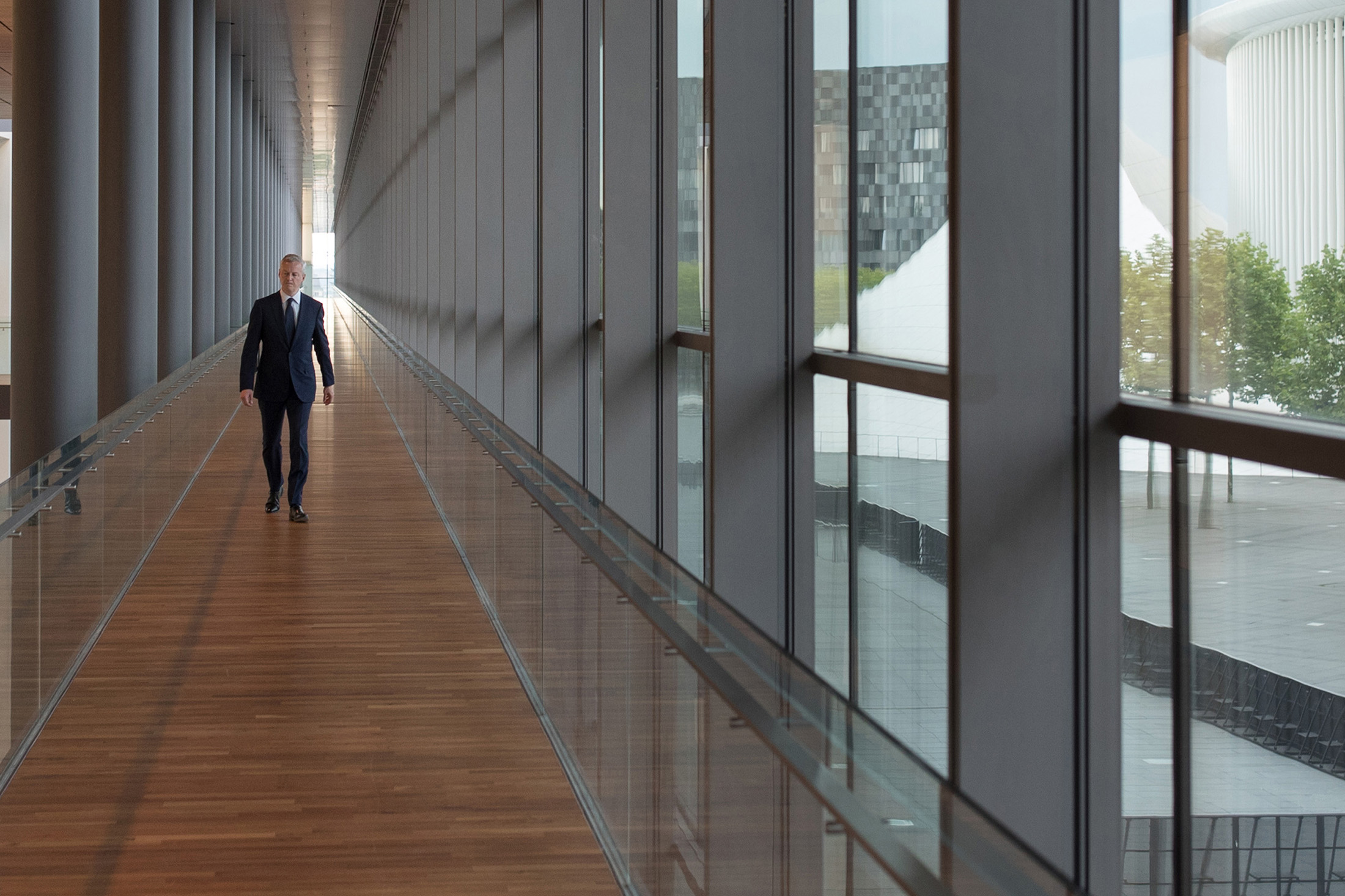 Bruno Le Maire, France's finance minister, walks along a corridor as he arrives for a Eurogroup meeting of European finance ministers in Luxembourg on Thursday, June 15, 2017. Euro area finance ministers plan to disburse EU8.5b bailout tranche for Greece, two officials familiar with the matter say, asking not to be named, pending final decision.
