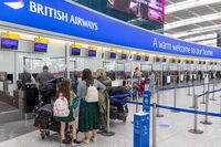 Passengers at check-in desks in Terminal 5 at London Heathrow Airport, May 17.