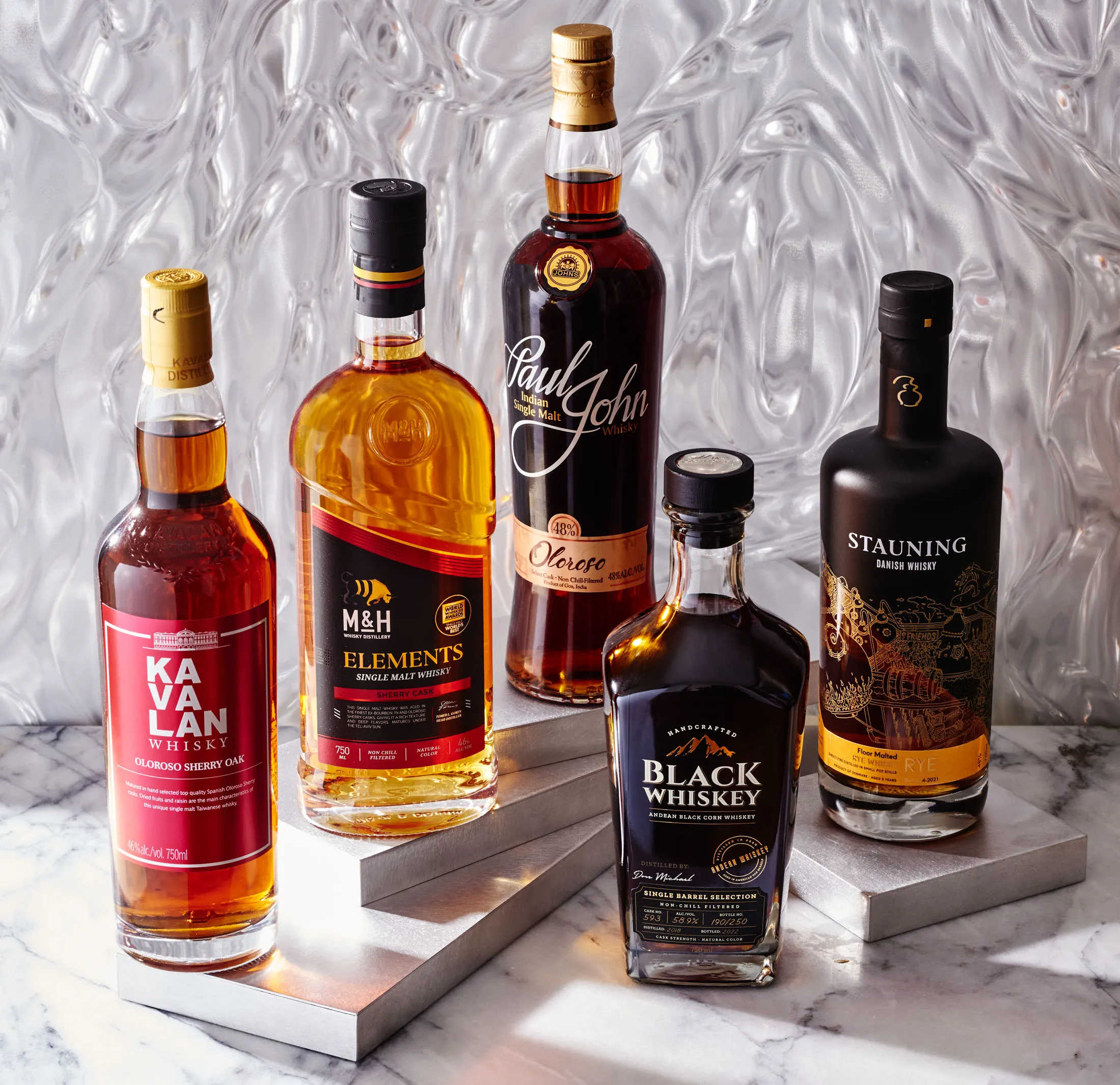 From left: Kavalan Oloroso Sherry&nbsp;Cask from Taiwan,&nbsp;M&amp;H Elements Sherry&nbsp;Cask from Israel,&nbsp;Paul John Oloroso Select Cask from India,&nbsp;Don Michael Black Single Barrel from Peru&nbsp; and Stauning Rye from Denmark.